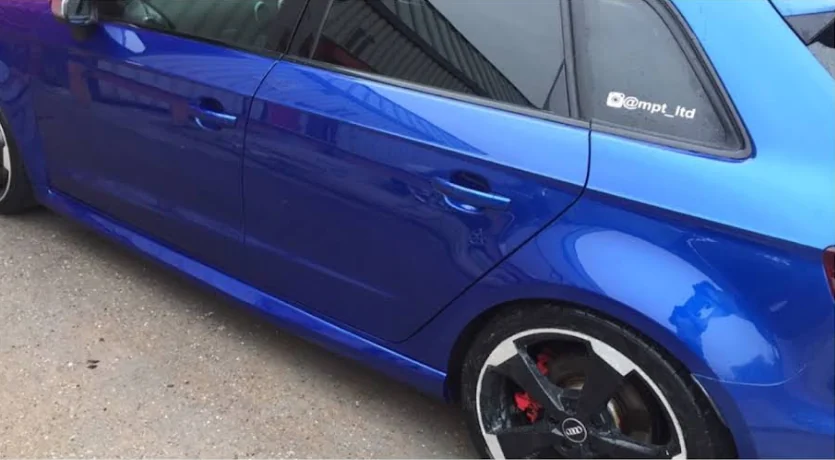 Blue Audi after side bodywork repair and paint