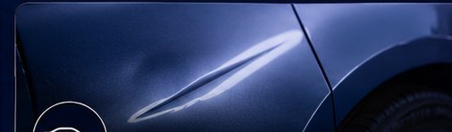 Crease dent on a vehicle panel