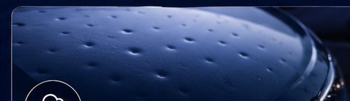 Minor hail dents on a vehicle panel