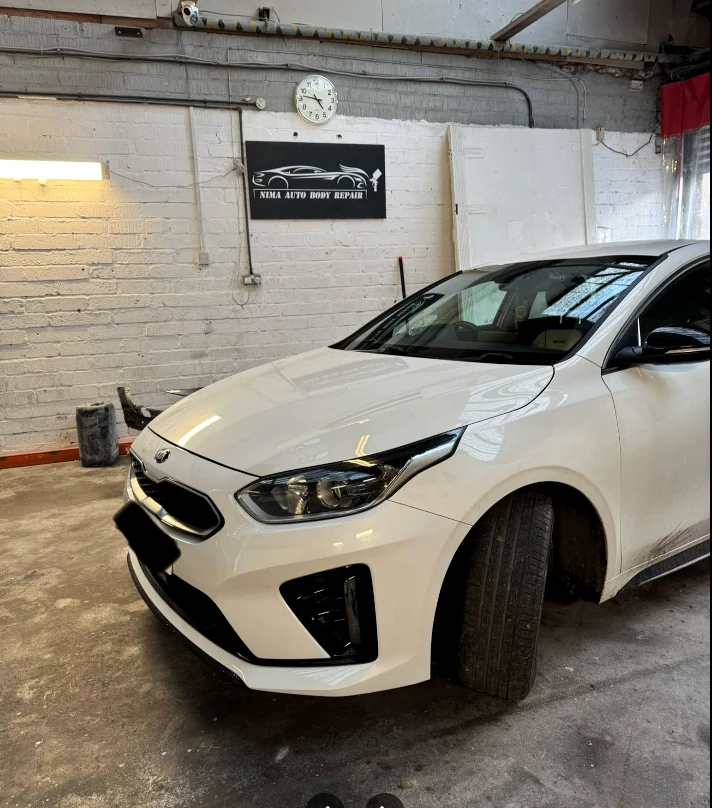 Vehicle inside Nima Auto Body Repair LTD workshop