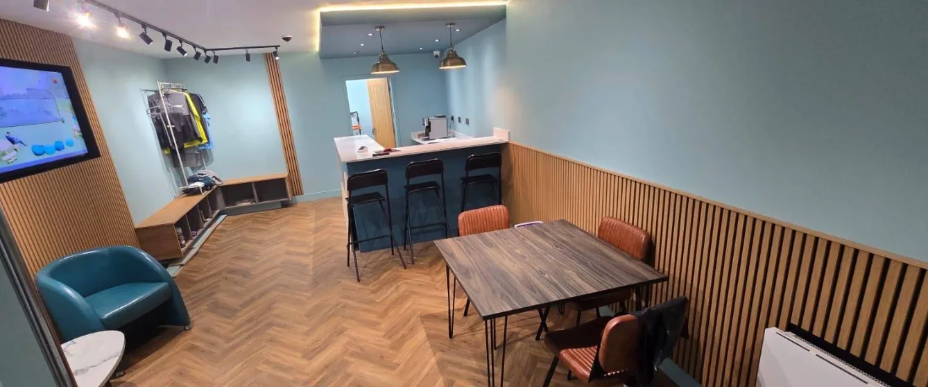 Commercial space with oak herringbone LVT flooring